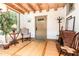 Charming entryway features wood floors, exposed beams, fireplace, and natural light at 3822 Chicken Bridge Rd, Pittsboro, NC 27312