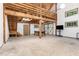 Large recreation room with high ceiling, exposed beams, ping pong table, and room for activities at 3822 Chicken Bridge Rd, Pittsboro, NC 27312