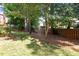 The backyard features a mix of sun and shade and a wooden fence at 3921 Robins Nest Ln, Wake Forest, NC 27587