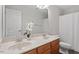 This bathroom has a double sink vanity with updated fixtures and a shower/tub combo at 3921 Robins Nest Ln, Wake Forest, NC 27587