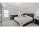 Spacious bedroom with trey ceilings, offering comfort and natural light from two windows at 3921 Robins Nest Ln, Wake Forest, NC 27587