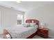 Cozy bedroom with bright natural light and soft neutral decor, creating a relaxing atmosphere at 3921 Robins Nest Ln, Wake Forest, NC 27587