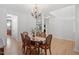 Charming dining room with hardwood floors and decorative lighting at 3921 Robins Nest Ln, Wake Forest, NC 27587