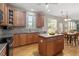 Updated kitchen boasting wood cabinets, a center island and stainless steel appliances at 3921 Robins Nest Ln, Wake Forest, NC 27587