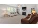 Inviting living room with fireplace, comfortable seating, and plenty of natural light at 3921 Robins Nest Ln, Wake Forest, NC 27587