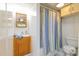 Bright bathroom with a vanity, shower and toilet at 394 Flanagan Rd, Henderson, NC 27537