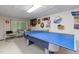 Entertaining game room with ping pong, dart board, and room to relax and play at 394 Flanagan Rd, Henderson, NC 27537