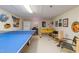 Spacious game room with ping pong, foosball, neon decor, and plenty of entertainment at 394 Flanagan Rd, Henderson, NC 27537