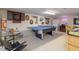 Fun game room with a ping pong table, various games and decorations at 394 Flanagan Rd, Henderson, NC 27537