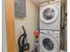 Efficient laundry room with stacked washer and dryer units at 394 Flanagan Rd, Henderson, NC 27537