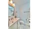Bathroom with a large mirror, vanity, and shower with neutral finishes at 406 Fairoaks Cir, Chapel Hill, NC 27516