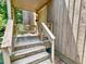 Inviting front porch with cozy seating, perfect for relaxing and enjoying the peaceful surroundings of the neighborhood at 406 Fairoaks Cir, Chapel Hill, NC 27516