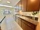 Well-equipped kitchen featuring stainless steel appliances, ample cabinet space, and a bright window with natural light at 406 Fairoaks Cir, Chapel Hill, NC 27516