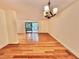 Spacious living room with natural light and hardwood floors, ideal for entertaining and relaxation at 406 Fairoaks Cir, Chapel Hill, NC 27516