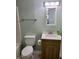 Charming bathroom with marble vanity, toilet, framed mirror, and modern fixtures at 411 W Raleigh St, Siler City, NC 27344