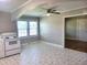 Eat-in kitchen features ceiling fan and pantry at 411 W Raleigh St, Siler City, NC 27344