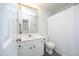 This bathroom includes bright lighting and a vanity at 4224 Vienna Crest Drive Dr, Raleigh, NC 27613