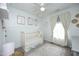 This sweet Bedroom features bright walls and charming decor at 4224 Vienna Crest Drive Dr, Raleigh, NC 27613