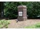 Community entrance with a brick sign surrounded by lush landscaping, creating an inviting atmosphere at 4224 Vienna Crest Drive Dr, Raleigh, NC 27613