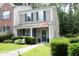 Charming two-story home with blue shutters, an American flag, and landscaped front yard at 4224 Vienna Crest Drive Dr, Raleigh, NC 27613