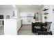 Bright kitchen with white cabinets, stainless steel appliances and a butcher block kitchen island at 4224 Vienna Crest Drive Dr, Raleigh, NC 27613
