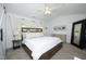 Spacious main bedroom features a ceiling fan, plush carpet, and neutral paint at 4224 Vienna Crest Drive Dr, Raleigh, NC 27613
