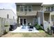 Spacious patio area with outdoor seating and grill, ideal for outdoor gatherings and enjoying the backyard at 4224 Vienna Crest Drive Dr, Raleigh, NC 27613