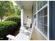 Cozy front porch featuring white rocking chairs, a welcome sign, and stylish decor at 4224 Vienna Crest Drive Dr, Raleigh, NC 27613