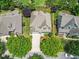 Aerial view of a home showcasing its well-maintained lawn and landscaping within a neighborhood at 4229 Cats Paw Ct, Wake Forest, NC 27587