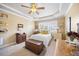 Bright bedroom featuring neutral walls, a ceiling fan, and natural light at 4229 Cats Paw Ct, Wake Forest, NC 27587