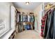 Spacious closet featuring custom shelving, racks, and natural light at 4229 Cats Paw Ct, Wake Forest, NC 27587