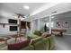 Spacious basement living area with fireplace, wet bar, and ample seating at 4404 Susan Dr, Raleigh, NC 27603