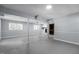 Unfinished basement with concrete floor, painted walls, and support beams at 4404 Susan Dr, Raleigh, NC 27603