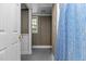 Bathroom showcasing printed shower curtain and adjacent room at 4404 Susan Dr, Raleigh, NC 27603