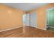 Bedroom featuring hardwood floors, fresh paint and closet near the bathroom at 4404 Susan Dr, Raleigh, NC 27603
