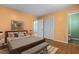 Inviting bedroom with hardwood floors, a comfortable bed, and ample closet space at 4404 Susan Dr, Raleigh, NC 27603