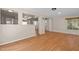 Bright living area featuring hardwood floors, neutral paint, and an open layout at 4404 Susan Dr, Raleigh, NC 27603