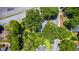 Overhead aerial shot of a house nestled in a green, tree-filled neighborhood at 503 Tarleton Ave, Burlington, NC 27215