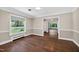 Cozy dining room with hardwood floors and large window at 503 Tarleton Ave, Burlington, NC 27215