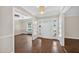 Inviting foyer with hardwood floors, a large front door with sidelights, and an open view to other living spaces at 503 Tarleton Ave, Burlington, NC 27215