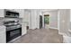 Bright kitchen with white cabinets and stainless steel appliances at 503 Tarleton Ave, Burlington, NC 27215