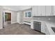 Spacious kitchen with white cabinets and stainless steel dishwasher at 503 Tarleton Ave, Burlington, NC 27215