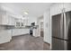 Contemporary kitchen featuring white cabinets and stainless steel appliances at 503 Tarleton Ave, Burlington, NC 27215