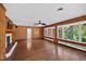 Spacious living room with hardwood floors, paneled walls, and natural light at 503 Tarleton Ave, Burlington, NC 27215