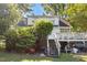 Home featuring a back deck with stairs down to the yard at 506 Currin St, Durham, NC 27703