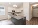Stylish kitchen with granite countertops, stainless steel appliances, and a gray kitchen island at 510 Branch St, Rocky Mount, NC 27801