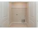 A large laundry room offers great utility with tile floors at 510 Branch St, Rocky Mount, NC 27801