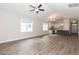 Spacious living room featuring luxury vinyl plank flooring, recessed lighting, and lots of natural light at 510 Branch St, Rocky Mount, NC 27801