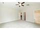 Large main bedroom with carpet flooring, a ceiling fan, and an ensuite bathroom at 510 Branch St, Rocky Mount, NC 27801