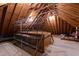 Spacious attic offers ample storage with wooden beams and open layout at 5123 Richland Dr, Raleigh, NC 27612